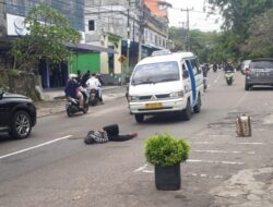 POPULER SEPEKAN: Seorang Wanita Berhijab Berbaring di Tengah Jalan hingga Pria Tewas Loncat dari Hotel
