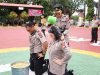 Naik Pangkat, 24 Personel Polres Karimun Mandi Air Kembang