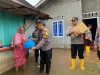Kapolres Bintan Kunjungi dan Beri Bantuan ke Warga Terdampak Banjir di Desa Malang Rapat